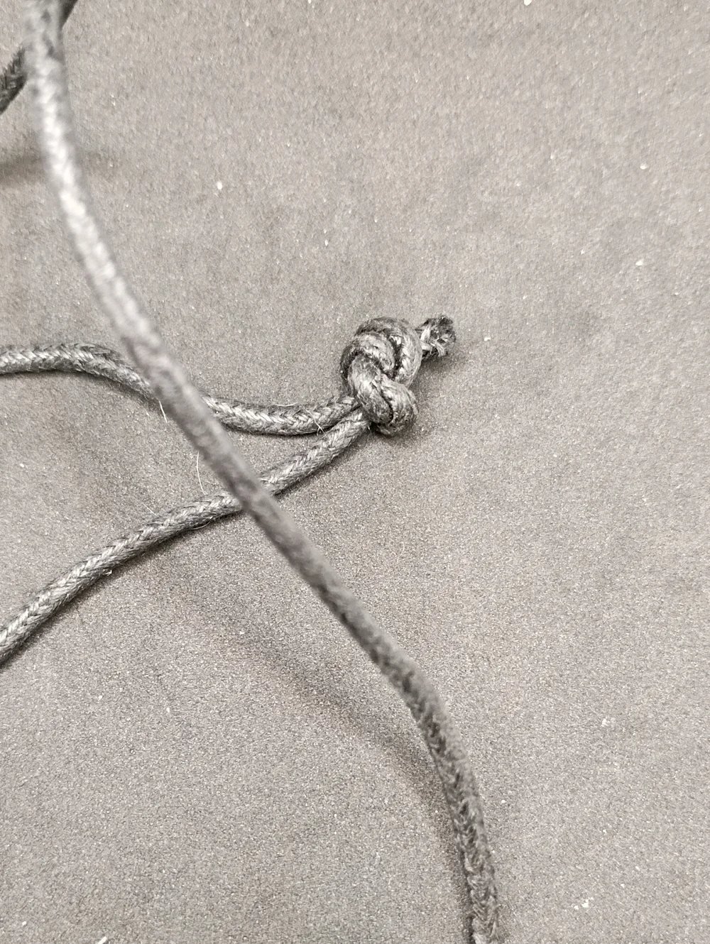 Unisex Black Cord Necklace with Bronze Arrow & Knife Charms